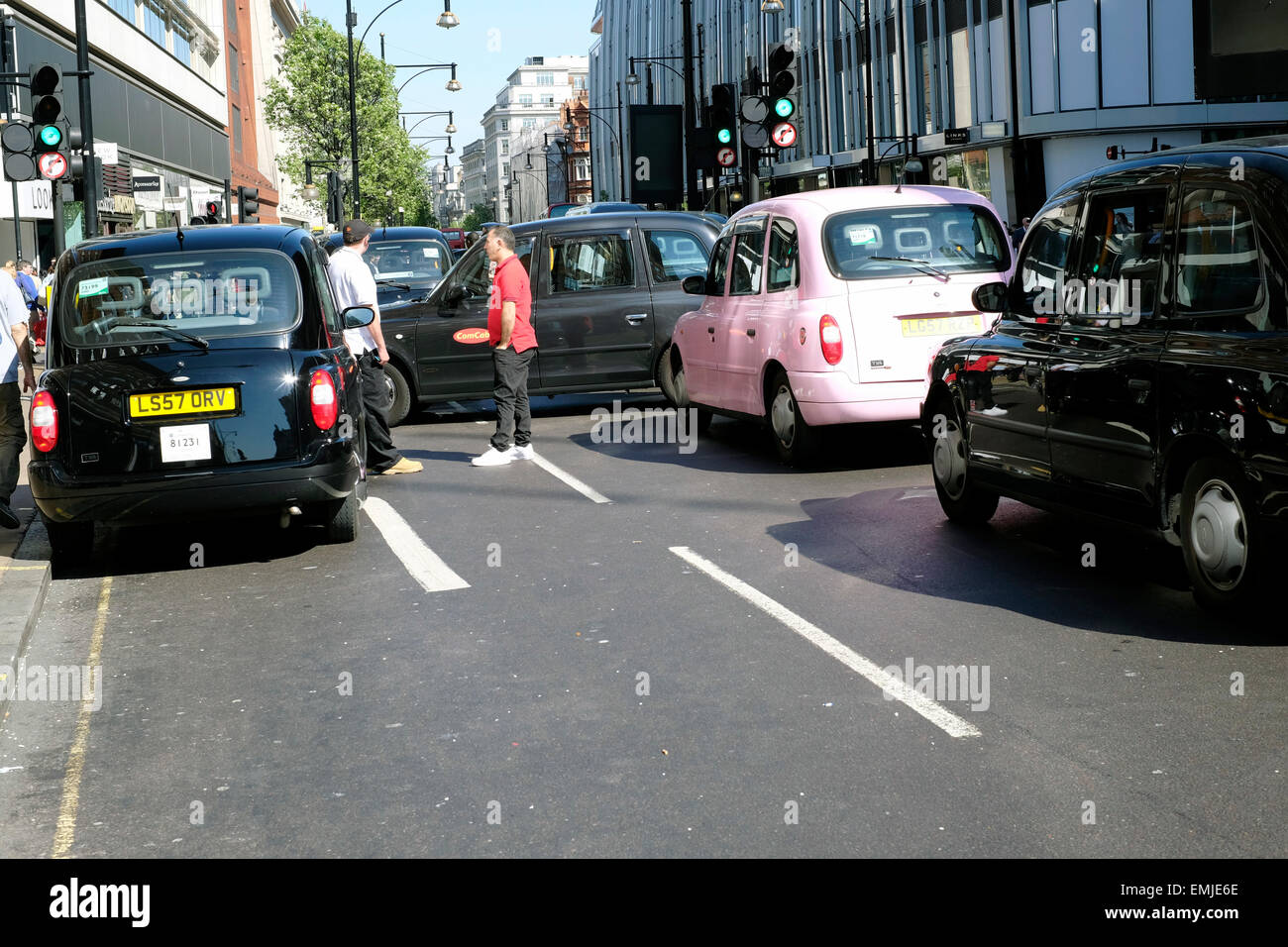Oxford Street blocked by  taxi drivers as they protest against illegal mini cabs. Stock Photo