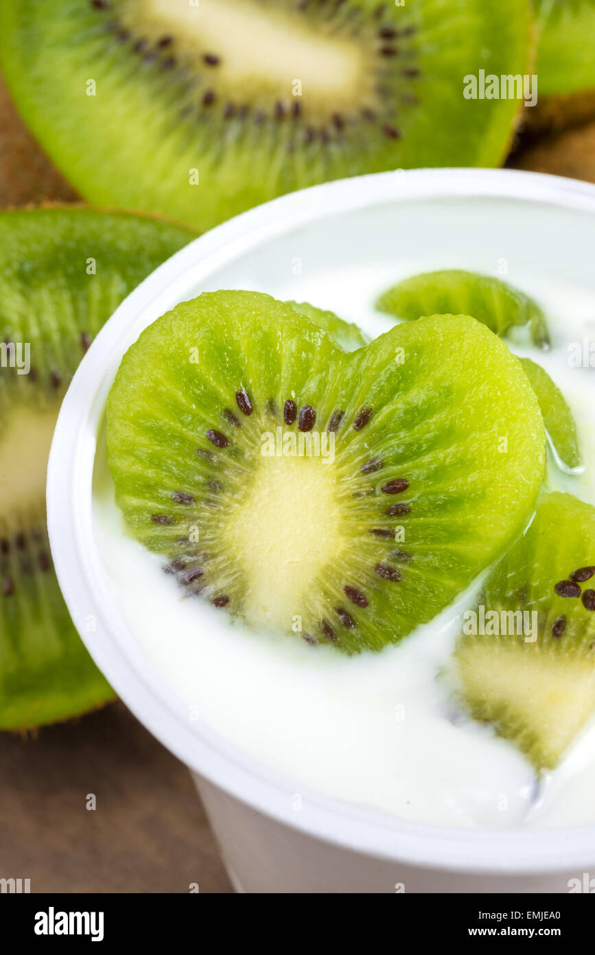 lowfat plain yogurt creamy kiwi flavor Stock Photo Alamy