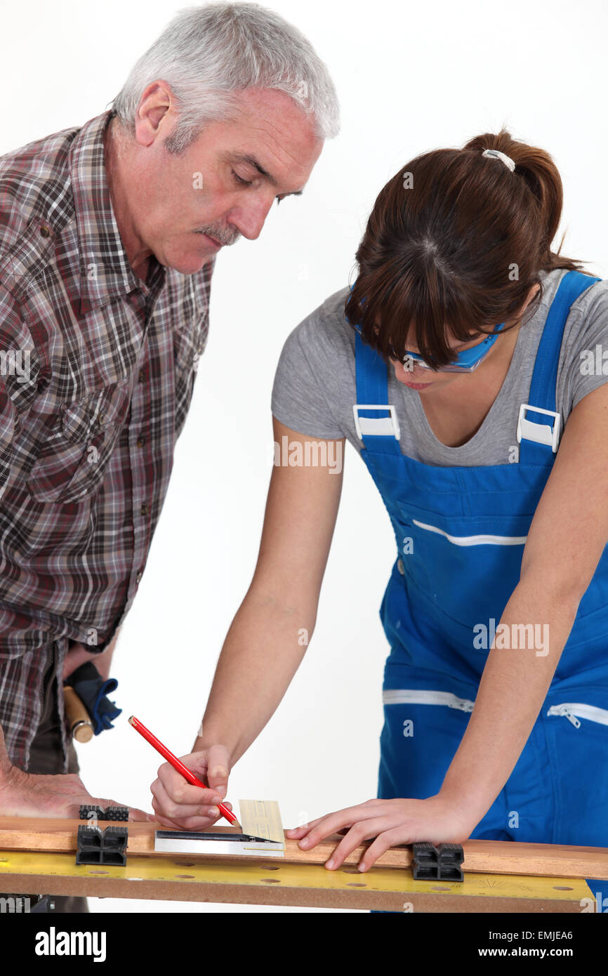 A carpenter and his apprentice Stock Photo Alamy