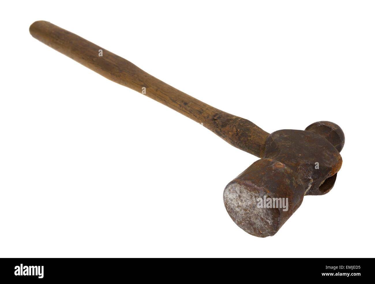 An old antique ball-peen hammer on a white background. Stock Photo