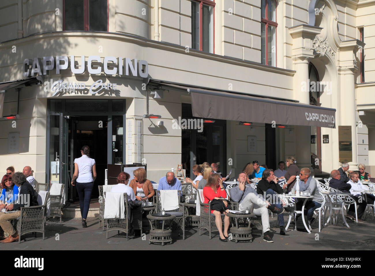 Germany Berlin Kurfürstendamm street scene cafe people Stock Photo