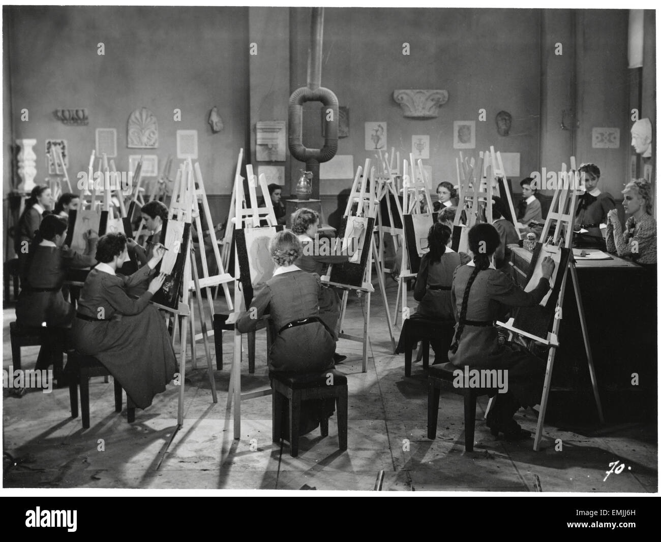 Students in Art Class, on-set of the Film “Claudine a L’ecole” directed by Serge de Poligny, 1939 Stock Photo