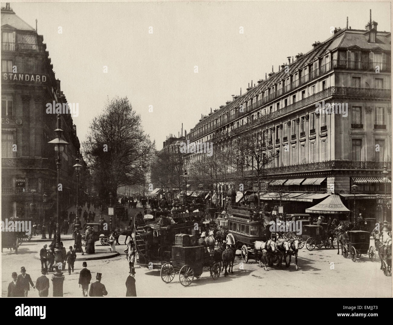 Crowded Street Scene, Boulevard des Capucines, Cafe de la Paix, Paris, France, Albumen print, circa 1890 Stock Photo