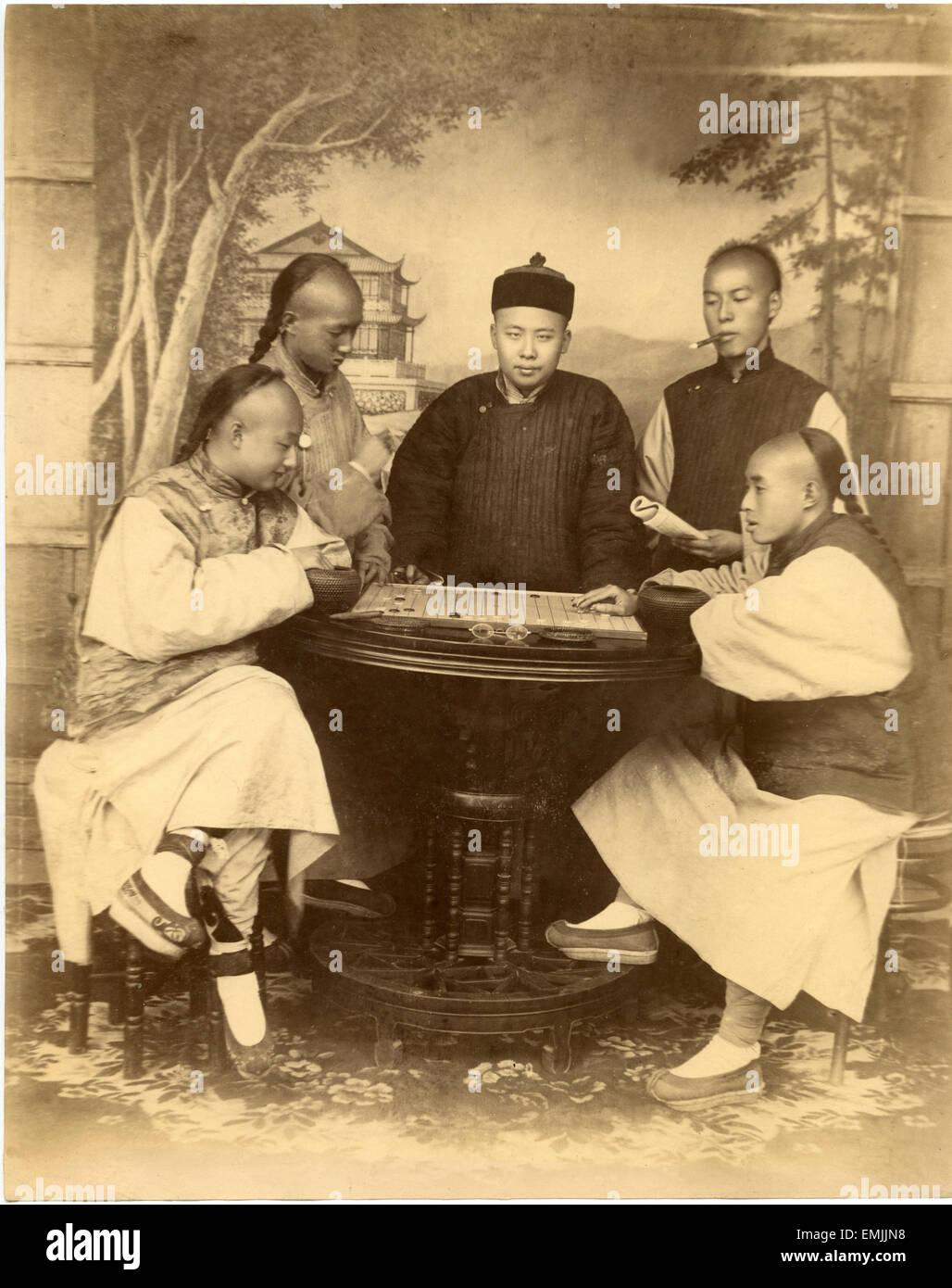 Chinese Men Playing Board Game, Shanghai, China, Albumen Print, circa 1880 Stock Photo