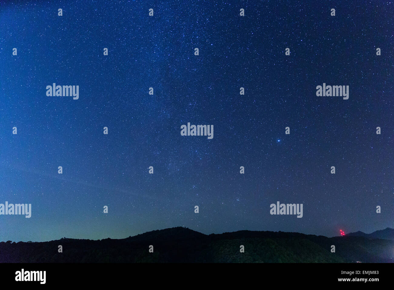 Guatemala, Jalapa, night sky with stars over a mountain range Stock Photo