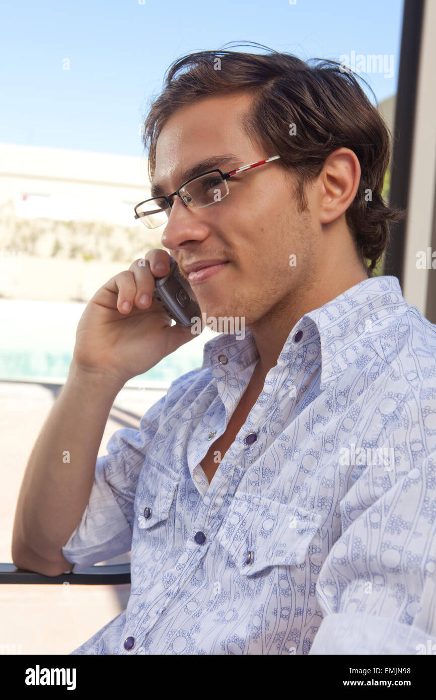 Young  office man speaking on smart phone Stock Photo