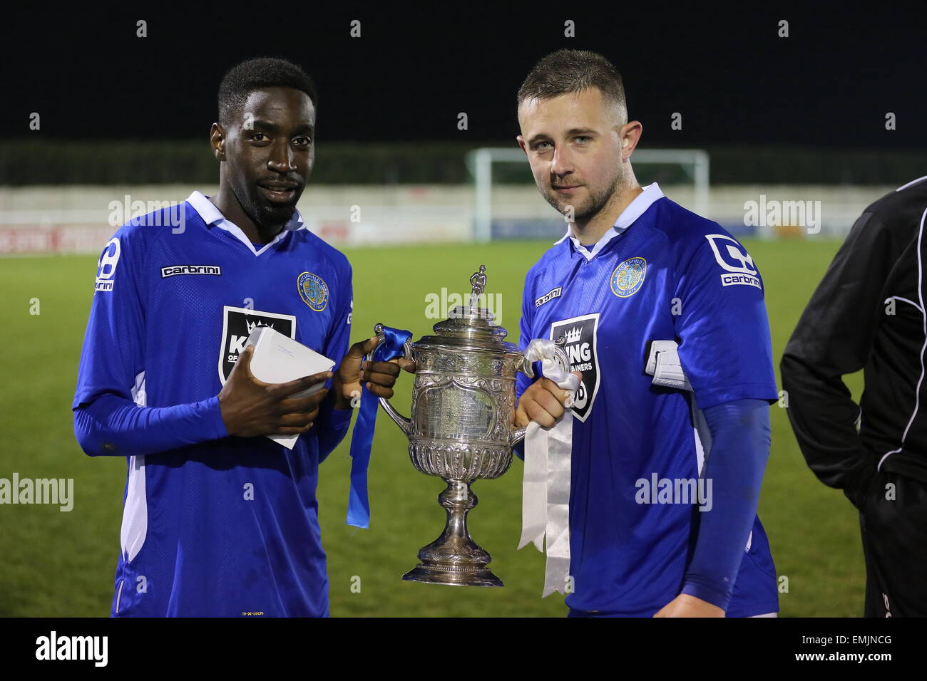 Nantwich, UK. 21st April, 2015. Macclesfield Town players Adriano Moke and Waide Fairhurst pose with the Cheshire Senior Cup having beat Northwich Victoria 3-2 in the final. Credit:  Simon Newbury / Alamy Live News Stock Photo