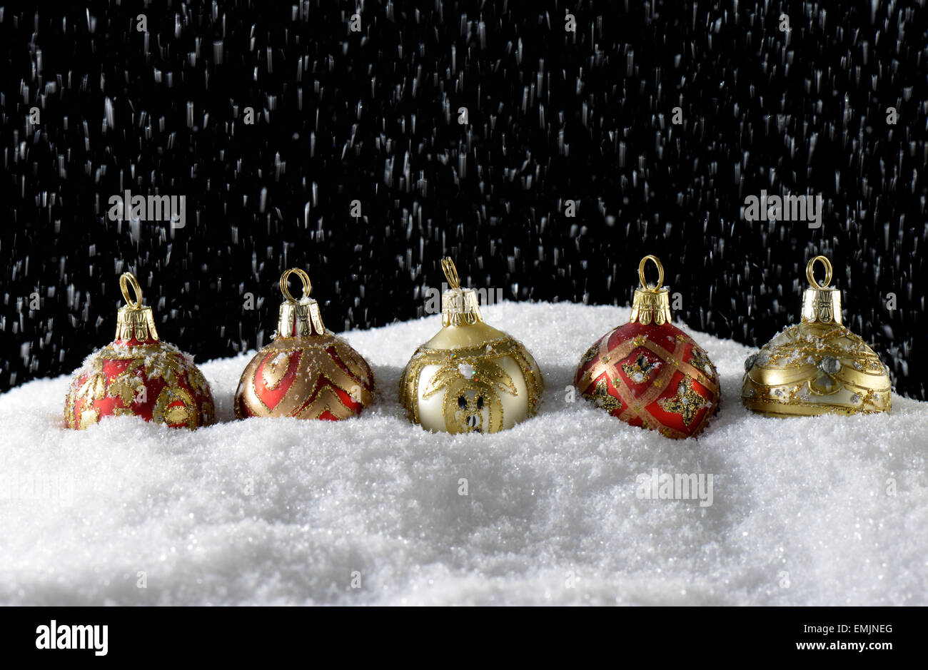 Christmas balls on snow Stock Photo