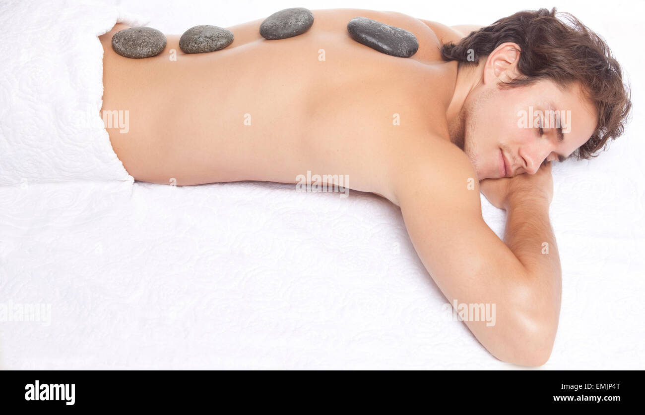 Young man enjoying spa treatment Stock Photo