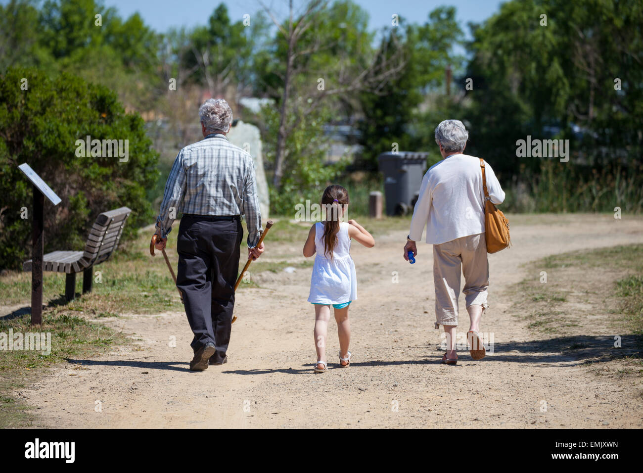 Grand parents and grand daughter having a stroll, Novato, California, USA Stock Photo