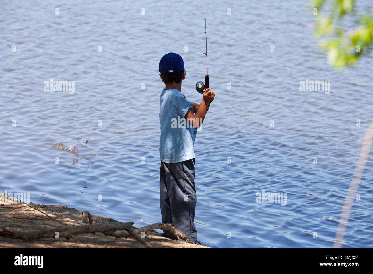 boy fishing at Scottsdale Pond, Novato, California, USA Stock Photo