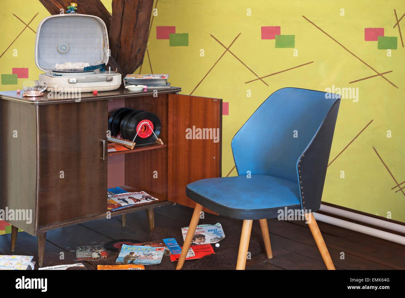 Record Cabinet With Record Player Chair And Wallpaper Of The