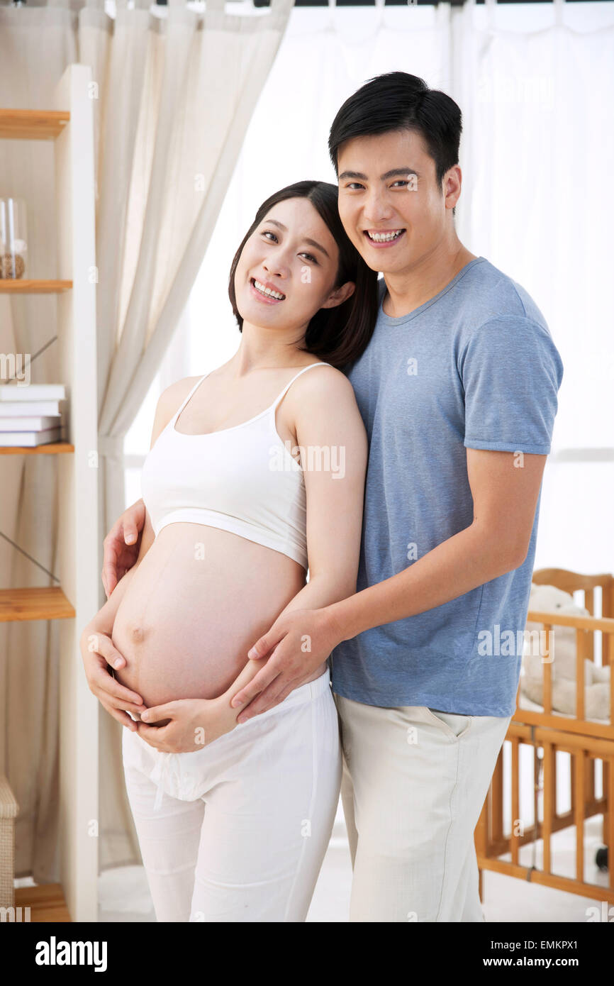 Husband hug pregnant wife hi-res stock photography and images