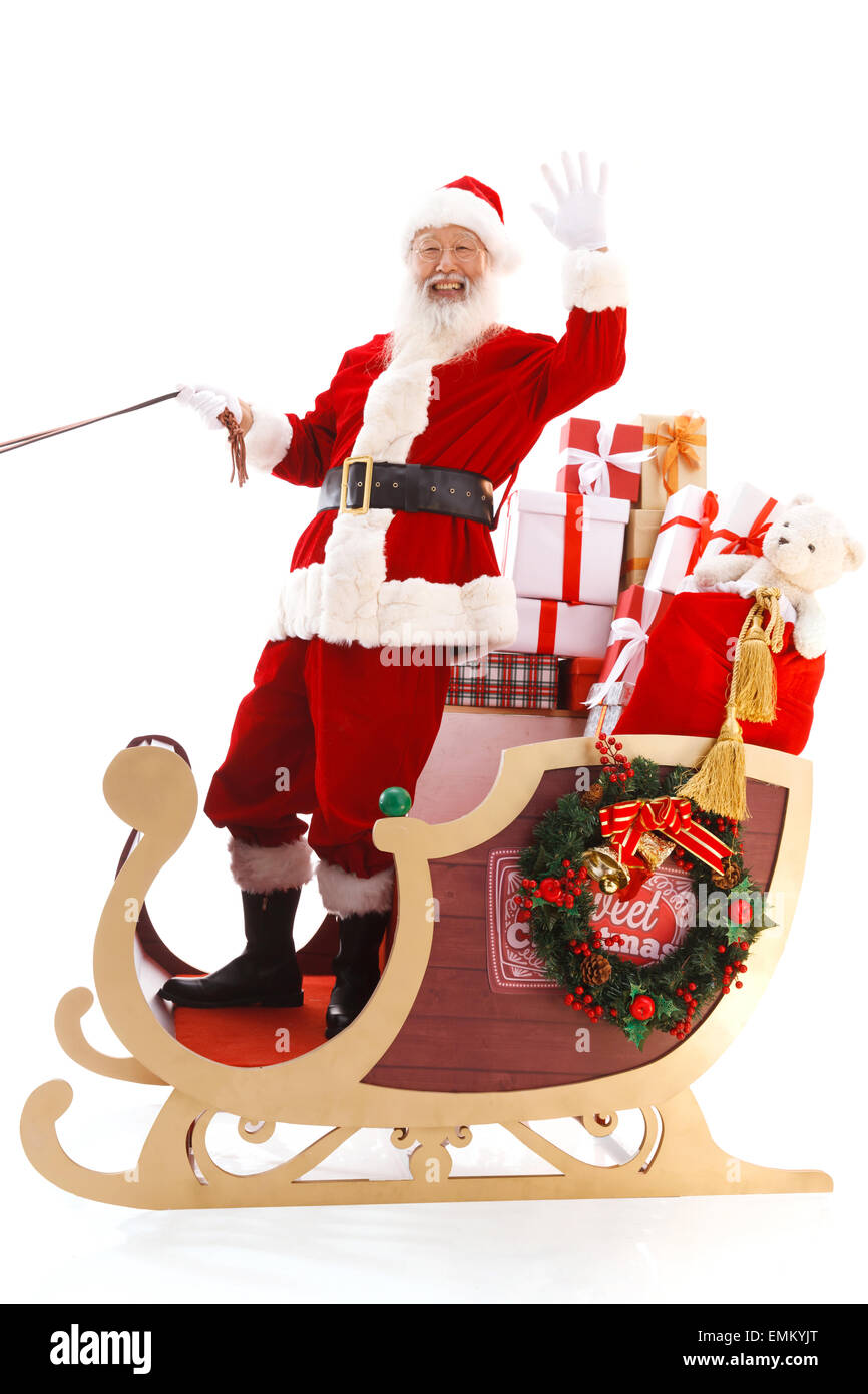 Santa rides the sled to send a gift Stock Photo