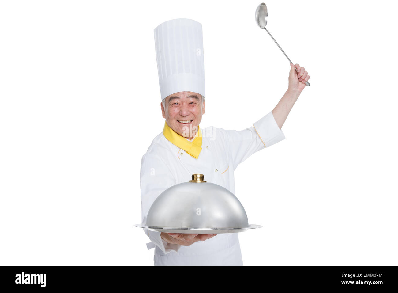 An elderly man wearing a chef's kitchen utensils and appliances Stock Photo