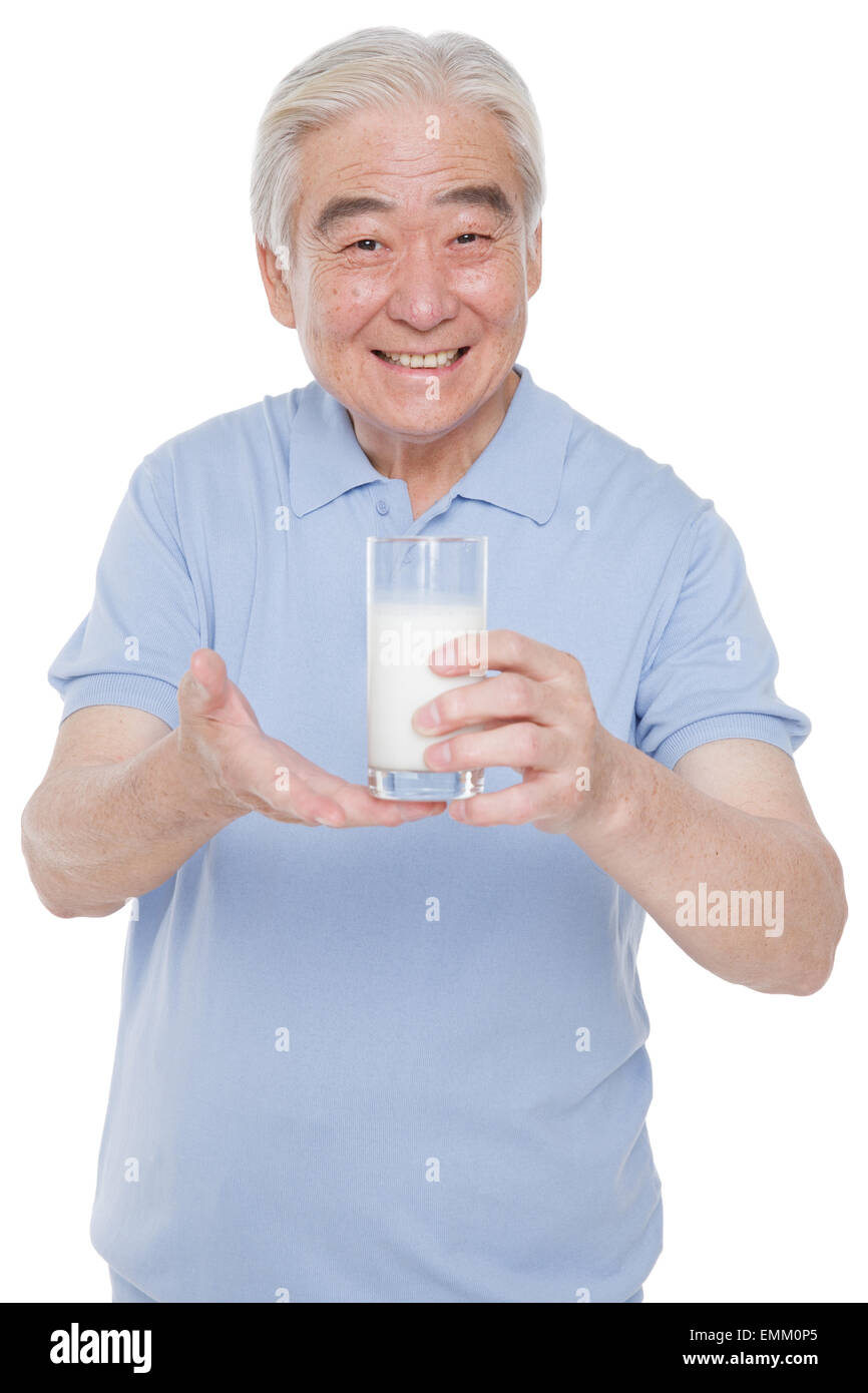 Man holding glass of milk hi-res stock photography and images - Page 3 -  Alamy