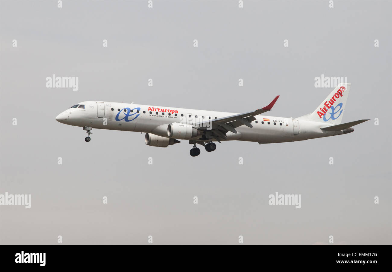 An Air Europa Embraer ERJ-195 approaching to the El Prat Airport in Barcelona, Spain. Stock Photo