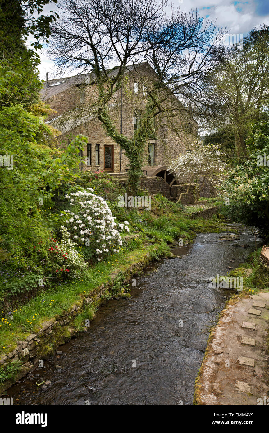 UK, England, Lancashire, Ribble Valley, Chipping, old mill converted to house beside Chipping Brook Stock Photo