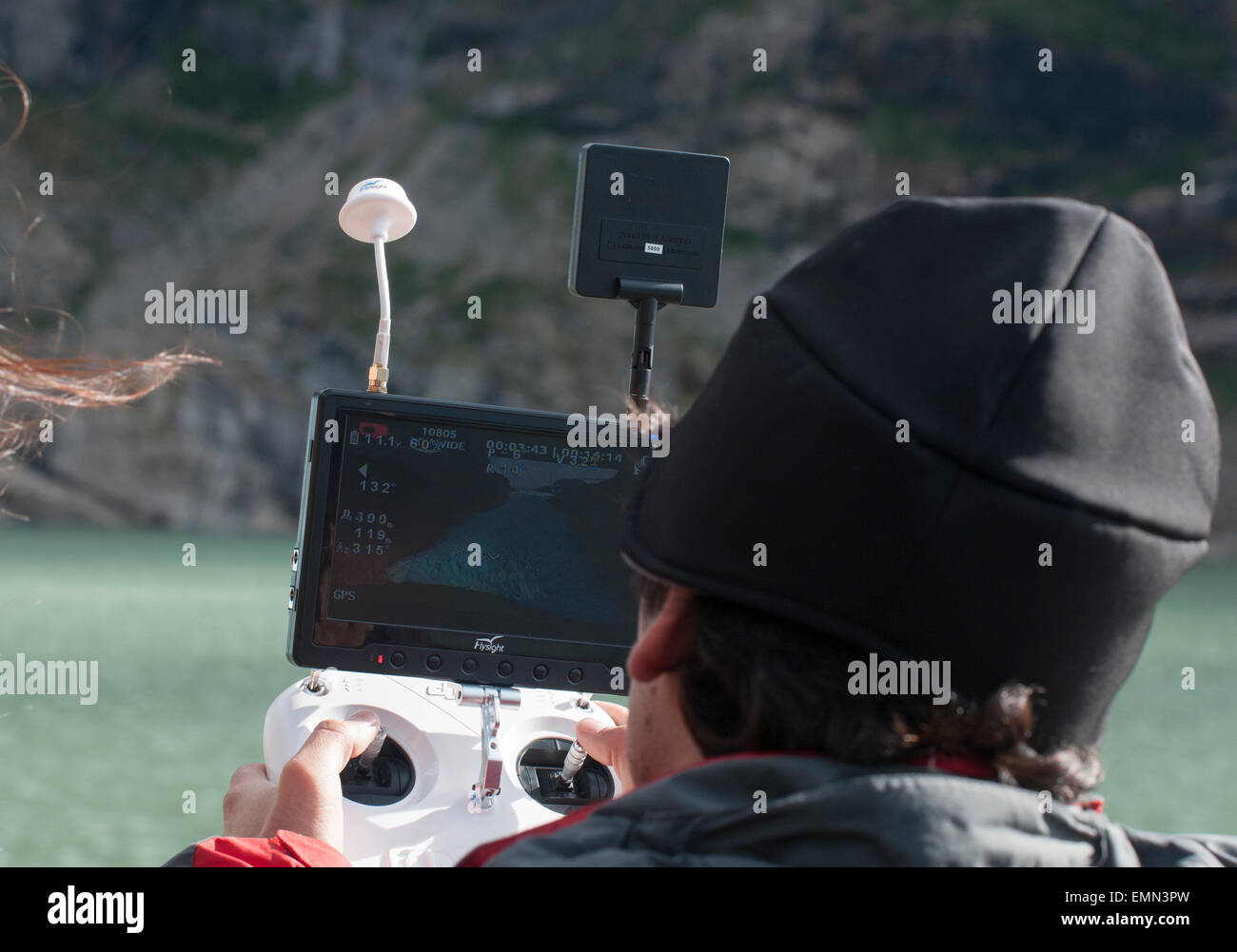 Man using a camera drone at Serrano Glacier in a Chilean national park Stock Photo