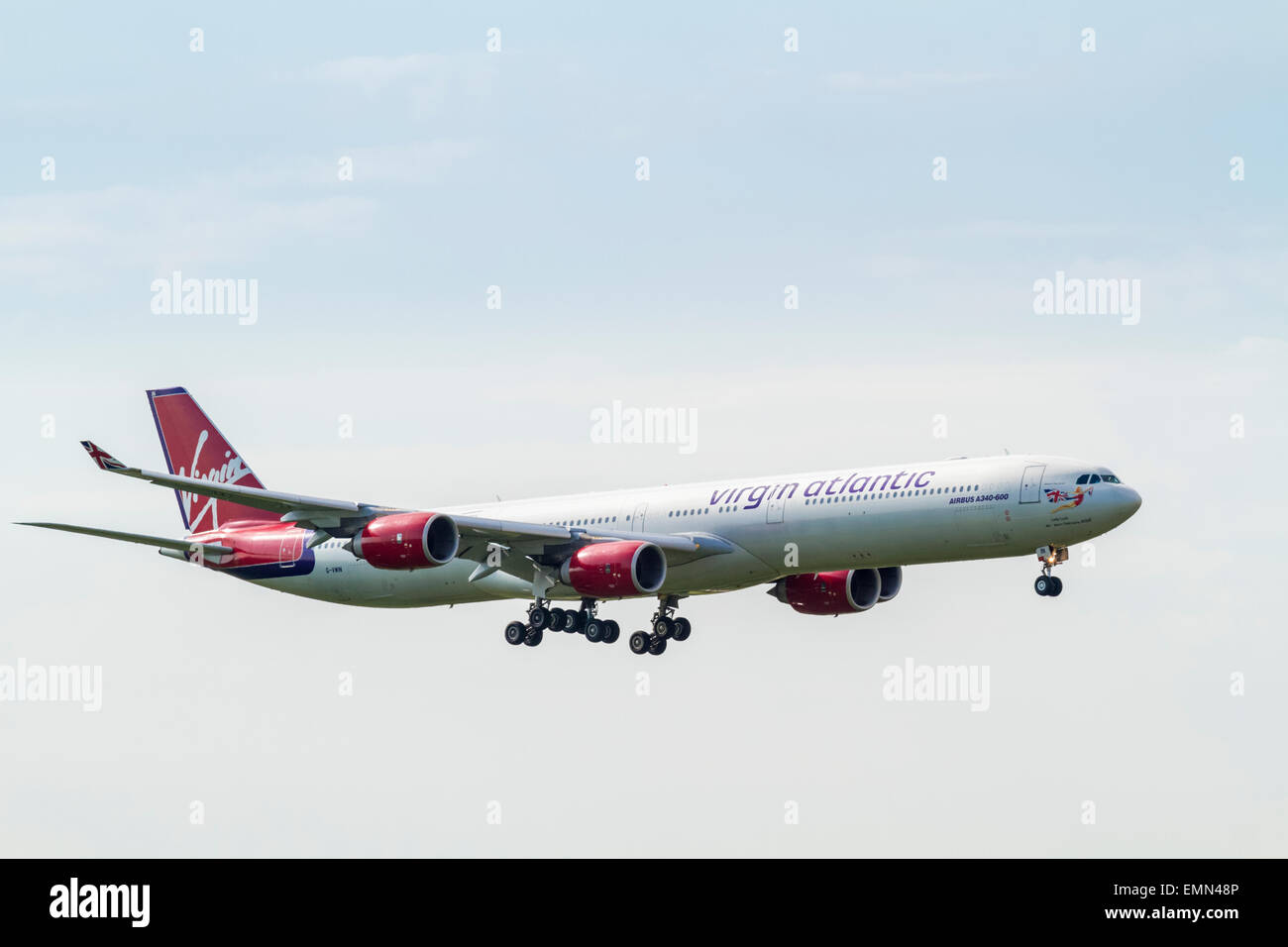 Virgin Atlantic Airbus A340-600 plane, G-VWIN, named Lady Luck, coming in to land. Stock Photo