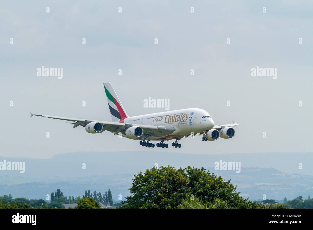 Emirates Airbus A380-800 plane, A6-EEK, on its approach for landing at Manchester Airport, England, UK Stock Photo