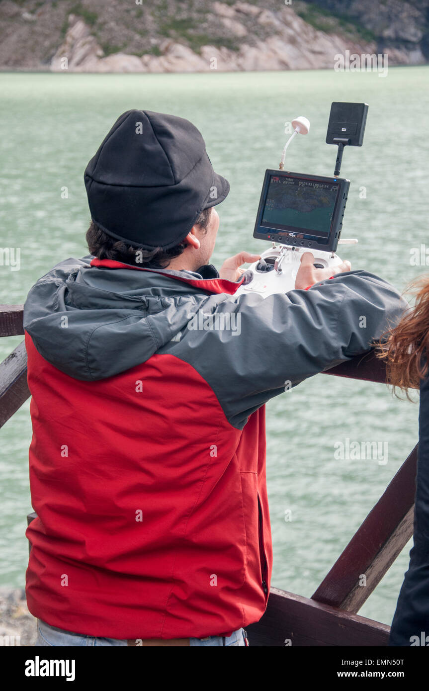 Man using a camera drone at Serrano Glacier in a Chilean national park Stock Photo
