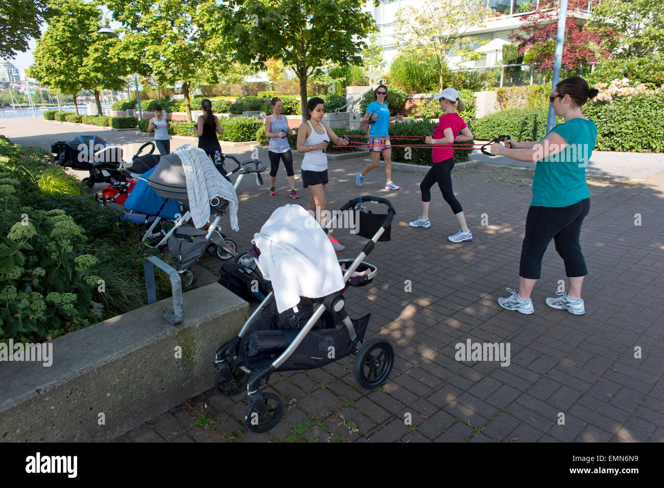 Young mothers doing post natal exercises in Vancouver Stock Photo