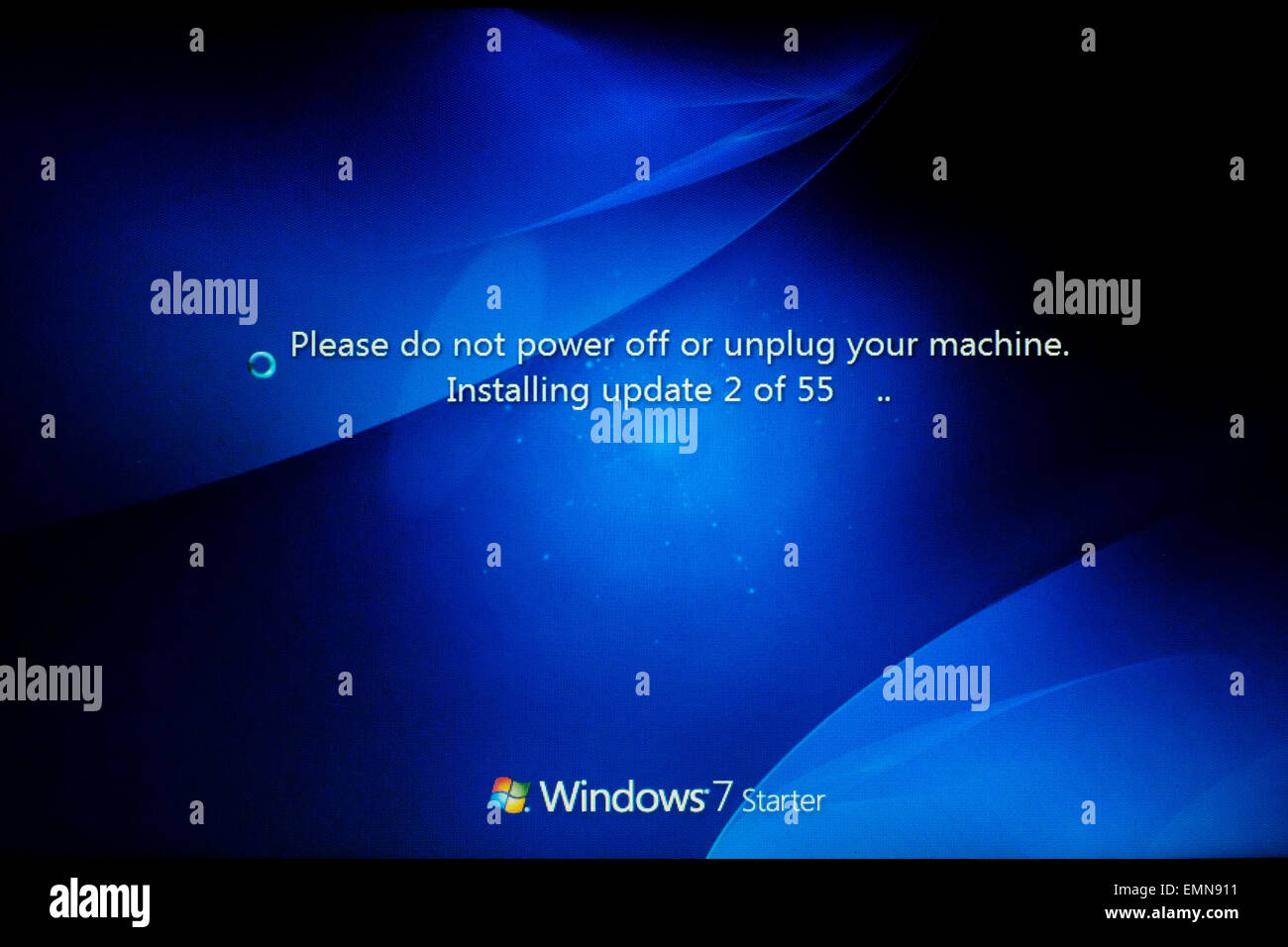 computer screen showing installation of numerous windows updates Stock Photo