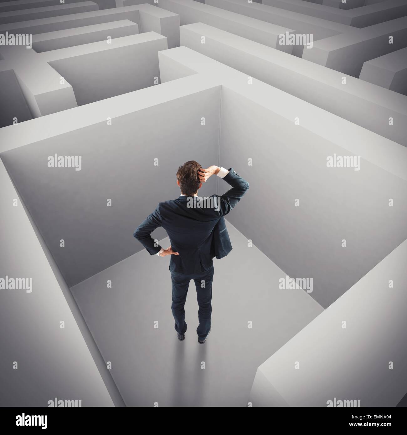 Businessman lost in a maze Stock Photo
