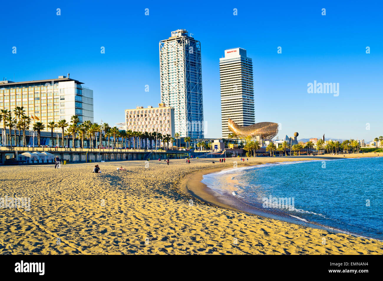 Barceloneta beach. Mapfre tower and Arts Hotel at skyline. Barcelona ...