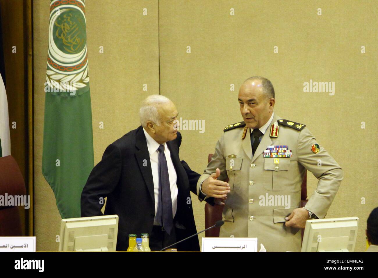 Cairo, Egypt. 22nd Apr, 2015. Arab League Secretary General Nabil al-Araby (L) speaks to Chief of Staff of the Egyptian army, Mahmoud Hegazy (R) during the Arab League meeting of the army chiefs from Arab League in Cairo, capital of Egypt, April 22, 2015.Arab military chiefs of staff discussed on Wednesday the formation of a joint Arab military force to combat terrorism and protect Arab national security. © Ahmed Gomaa/Xinhua/Alamy Live News Stock Photo