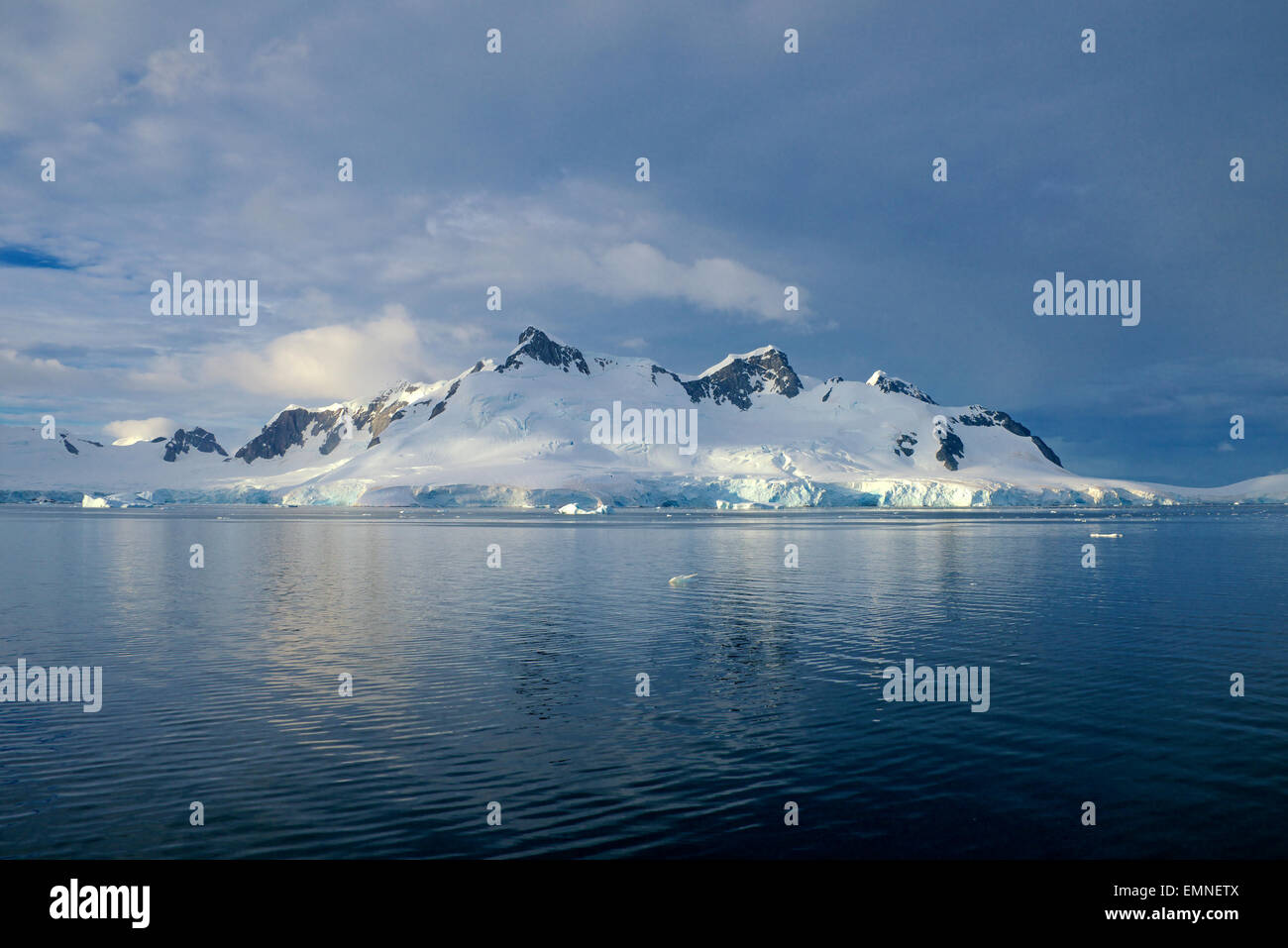 Snow covered mountains Lemaire Channel Antarctic Peninsular Antarctica Stock Photo