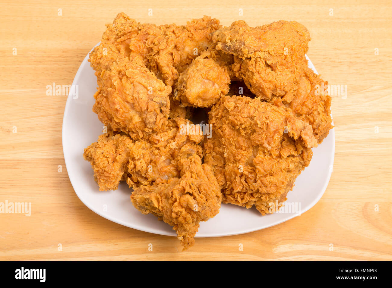 Fresh, crispy, fried chicken on a white plate Stock Photo