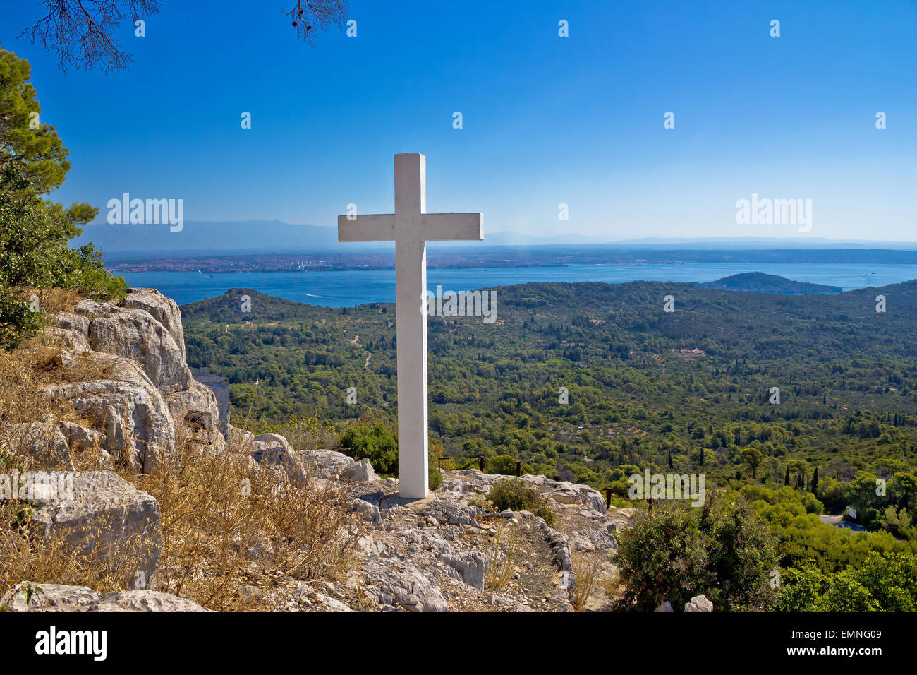 Cross overlooking islands of Croatia, top of Ugljan island in Dalmatia region Stock Photo