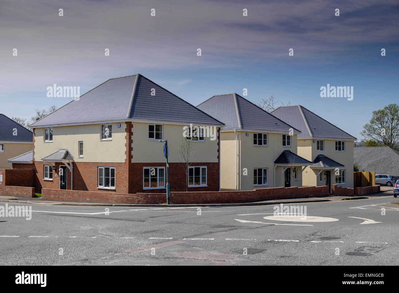 NEW BUILD HOUSES AT ROAD JUNCTION IN TUTSHILL GLOUCESTERSHIRE UK Stock Photo