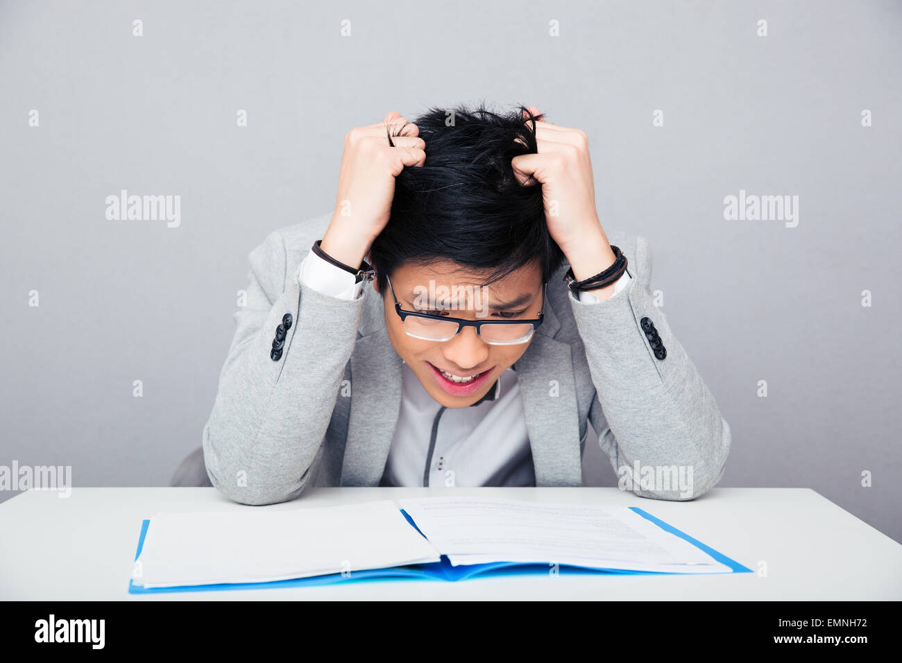Chinese man reading paper hires stock photography and images Alamy