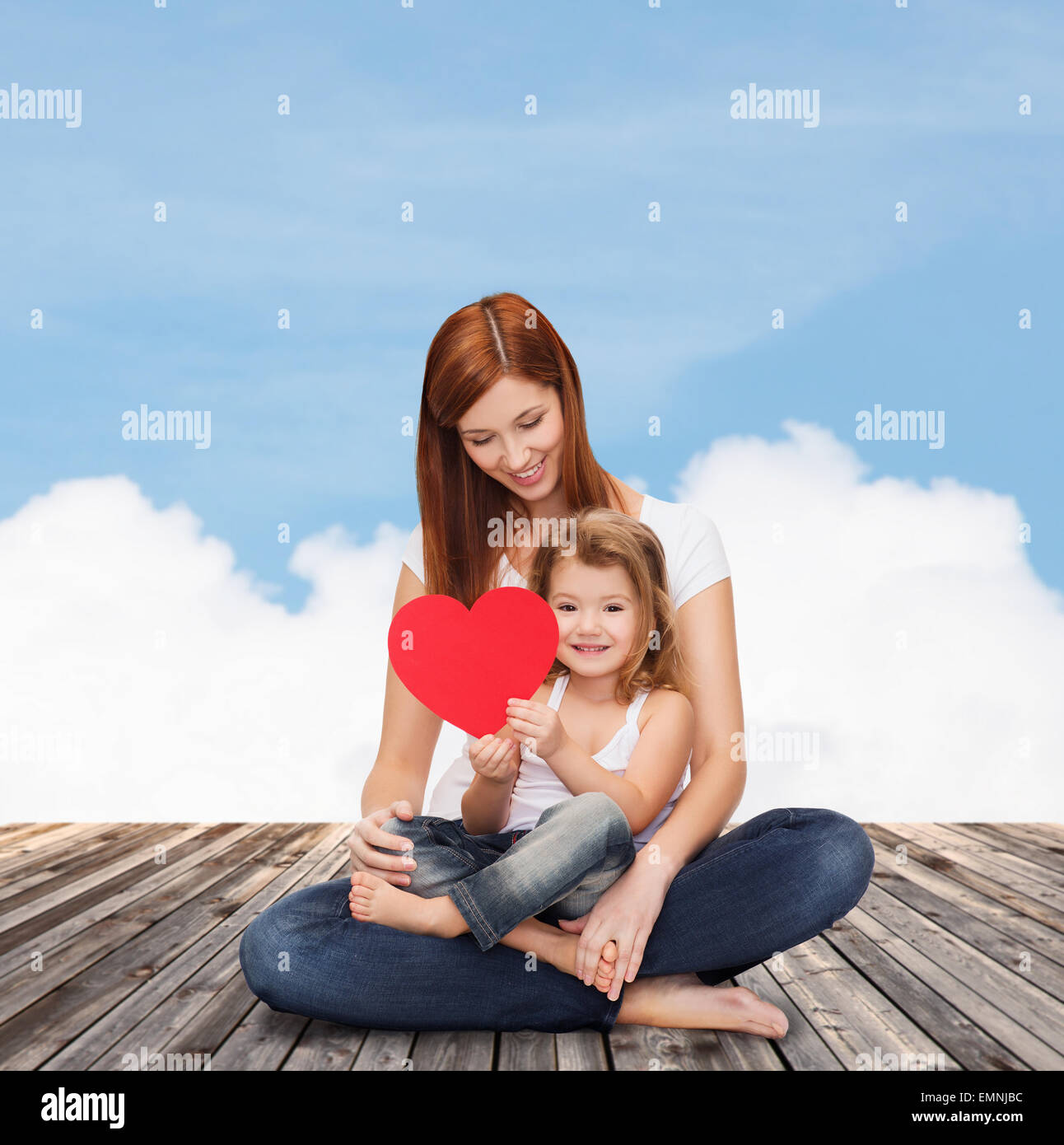 happy mother with adorable little girl and heart Stock Photo - Alamy