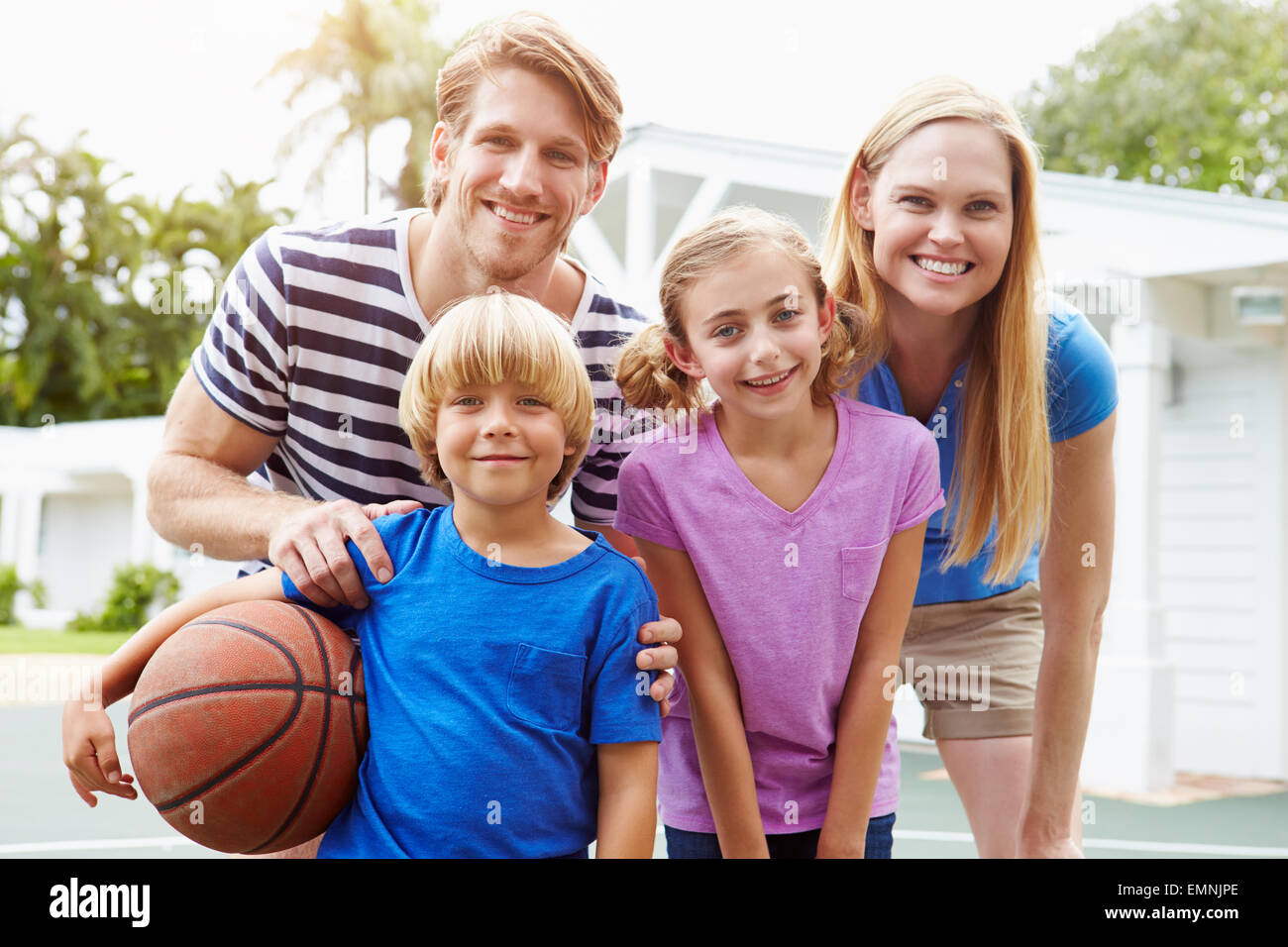 Portrait Of Family Playing Basketball Together Stock Photo - Alamy