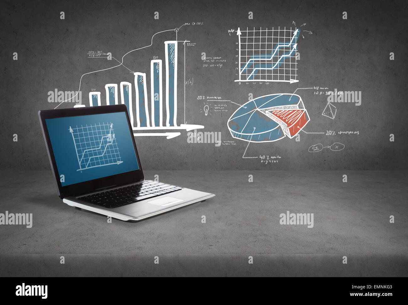 laptop computer with graph on screen Stock Photo - Alamy