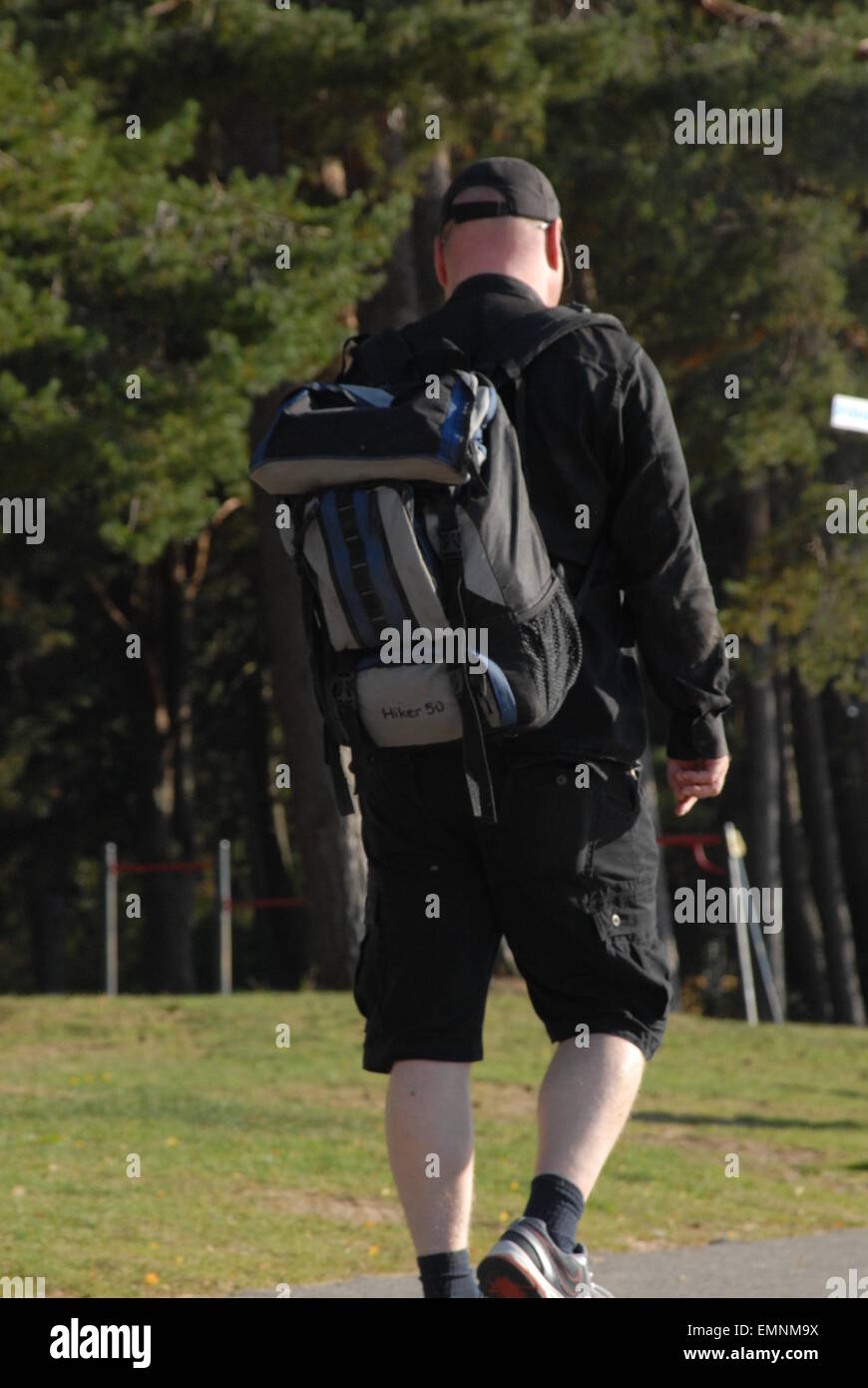 Man with backpack Stock Photo - Alamy