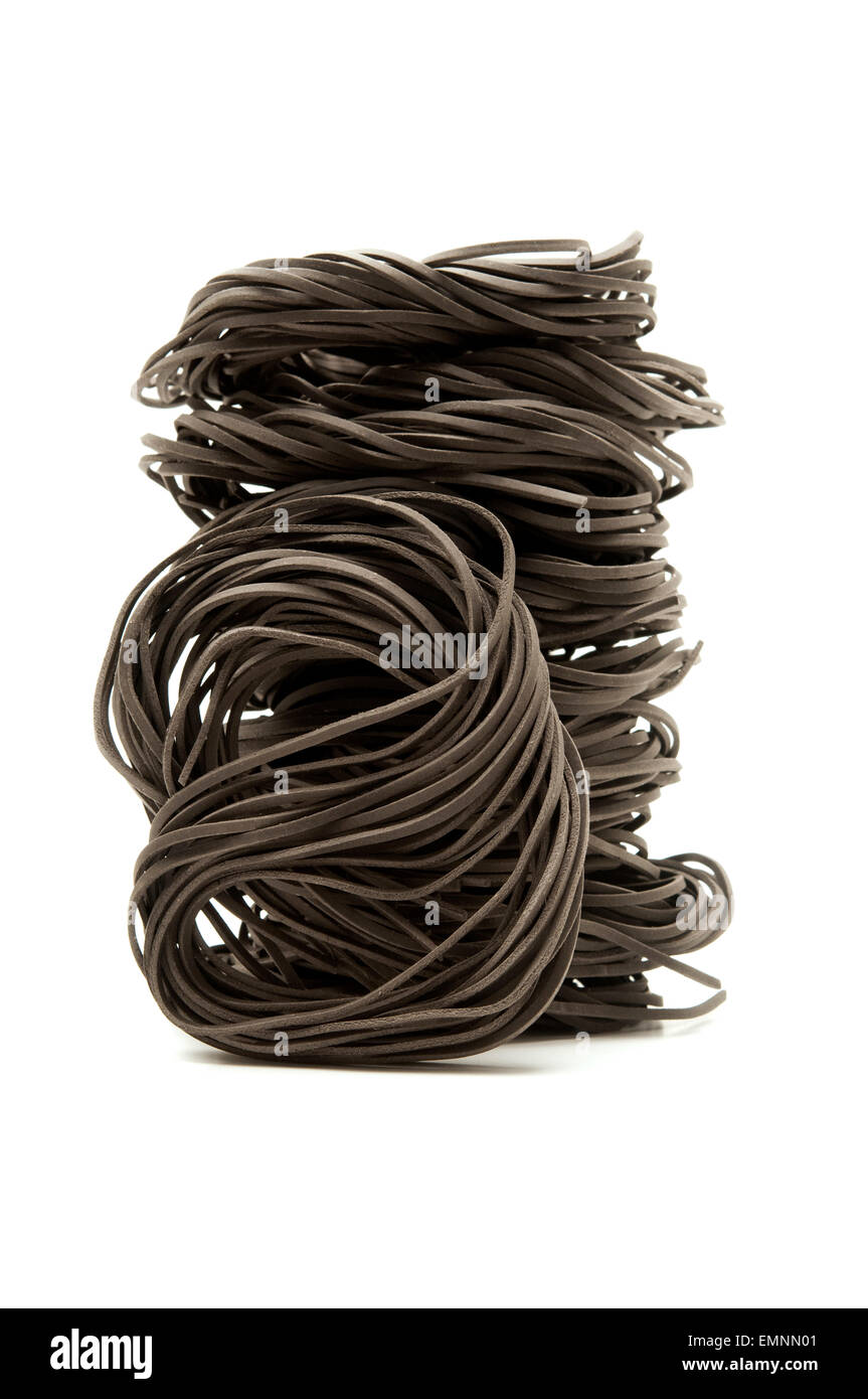 Squid ink taglierini on a white background Stock Photo