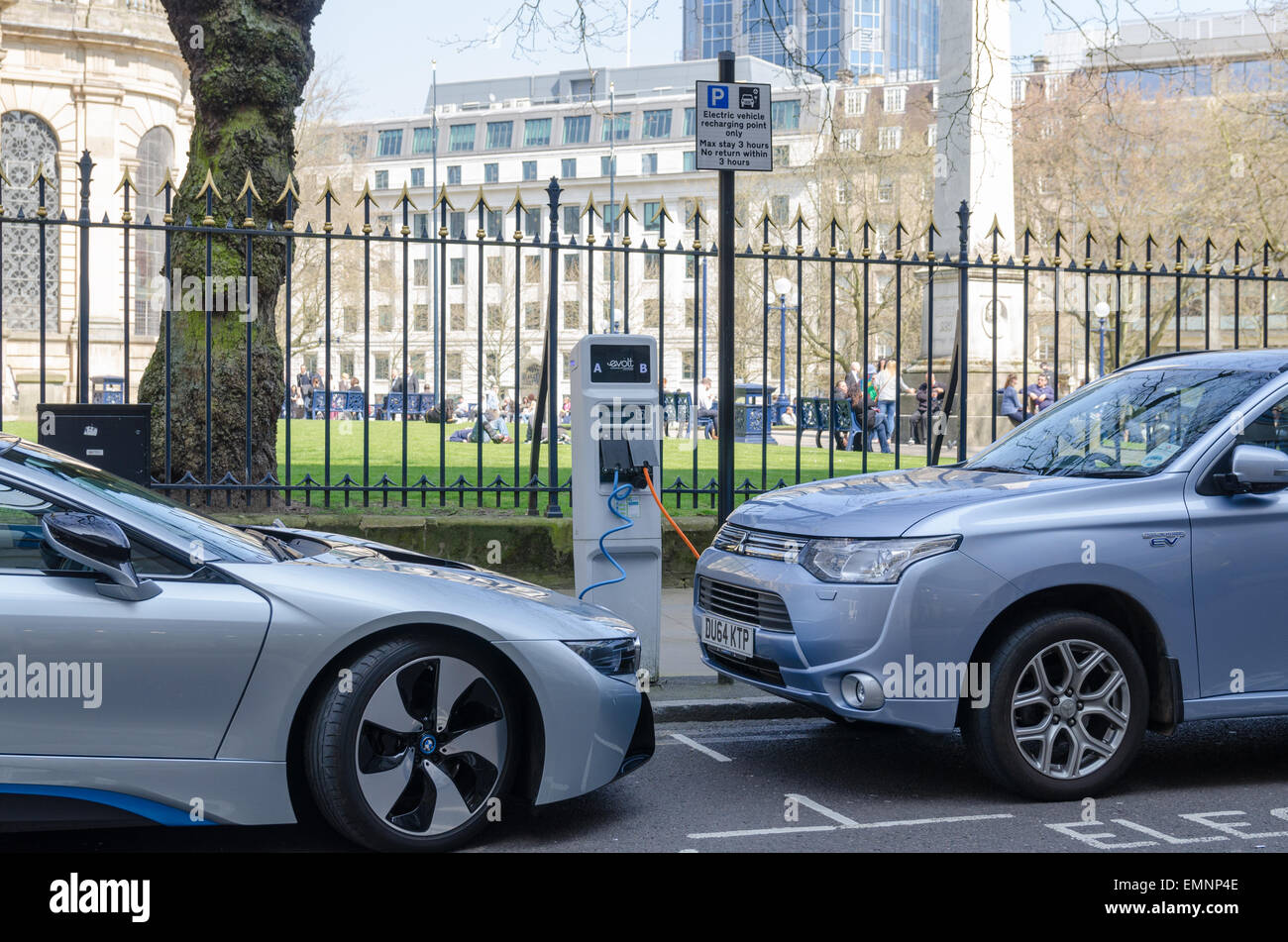 Electric cars charging in Birmingham City Centre Stock Photo