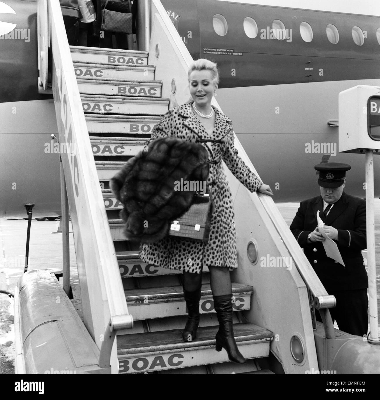 Actress Zsa Zsa Gabor arrives at London Heathrow Airport from New York  Friday 20th September 1968. She was met by her daughter Constance Hilton  a.k.a. Francesca Hilton & with a golden spaniel