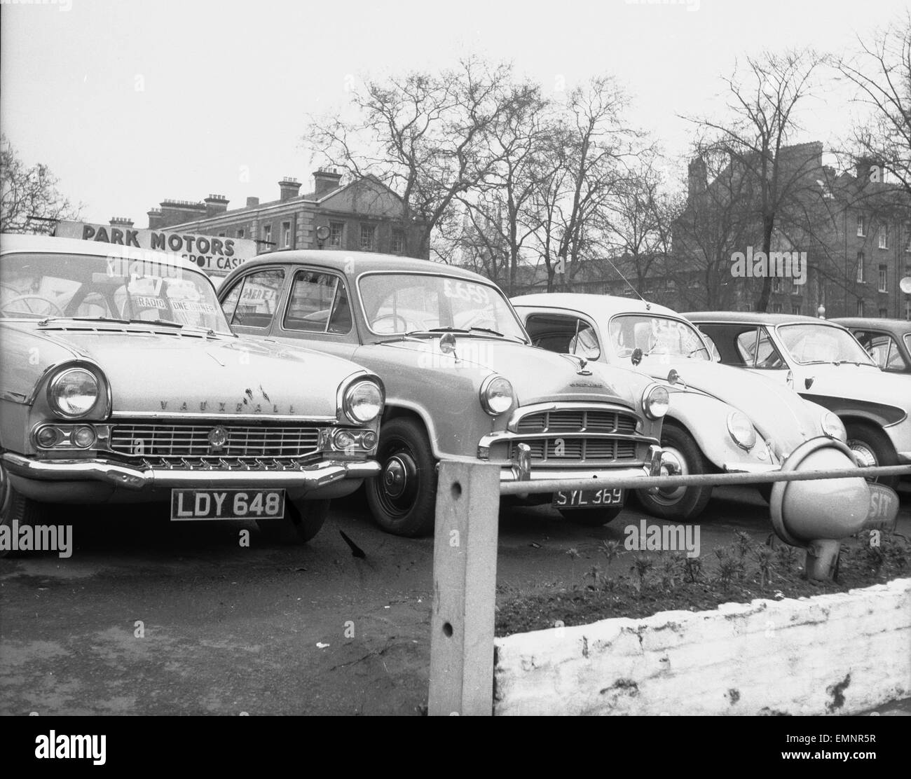 Prices slashed as a crisis hits the second hand car market. A second hand car lot in the Kings Road Chelsea. 23rd February 1960 Stock Photo