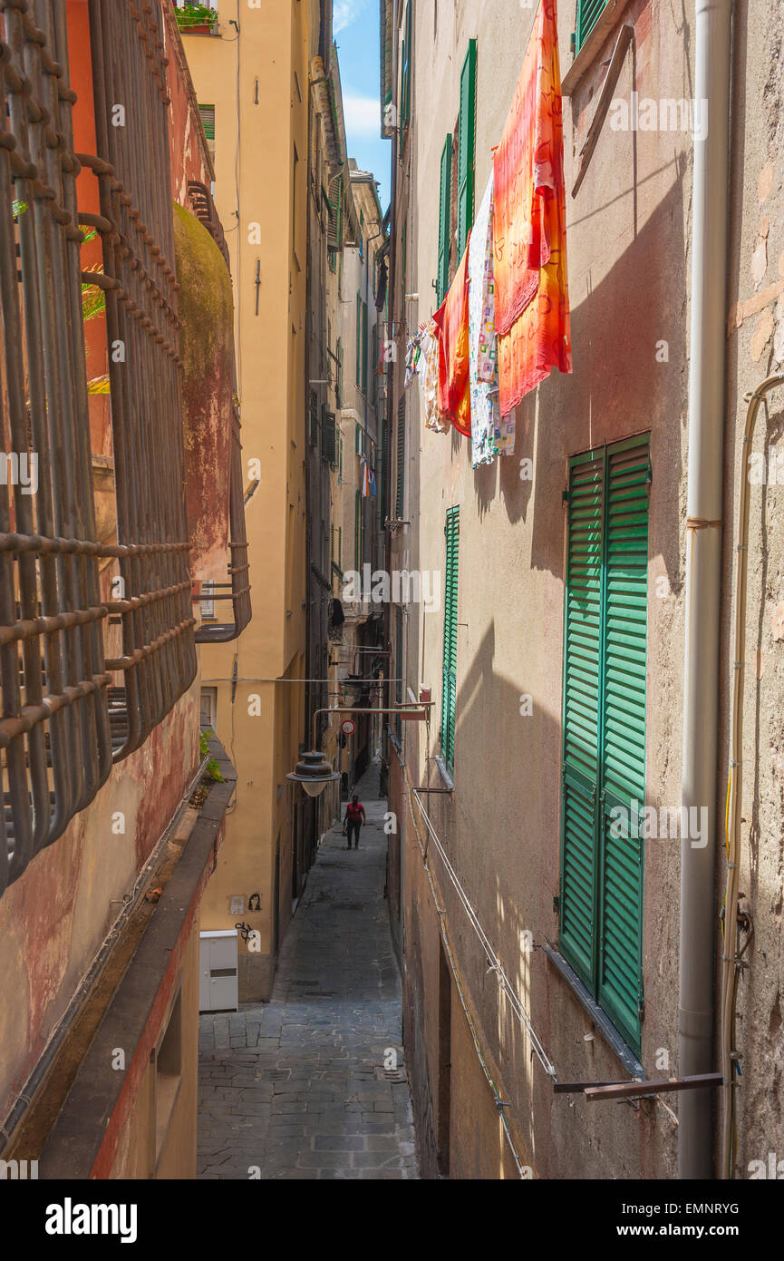 Genoa alley, view in summer of a typical narrow street in the medieval center of Genova - the Centro Storico - Liguria, Italy. Stock Photo