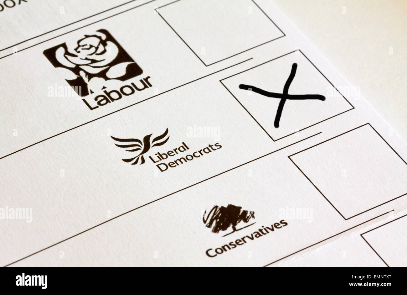 UK General Election ballot paper with boxes marked for voting for different political party candidates with Lib Dem cross in box Stock Photo