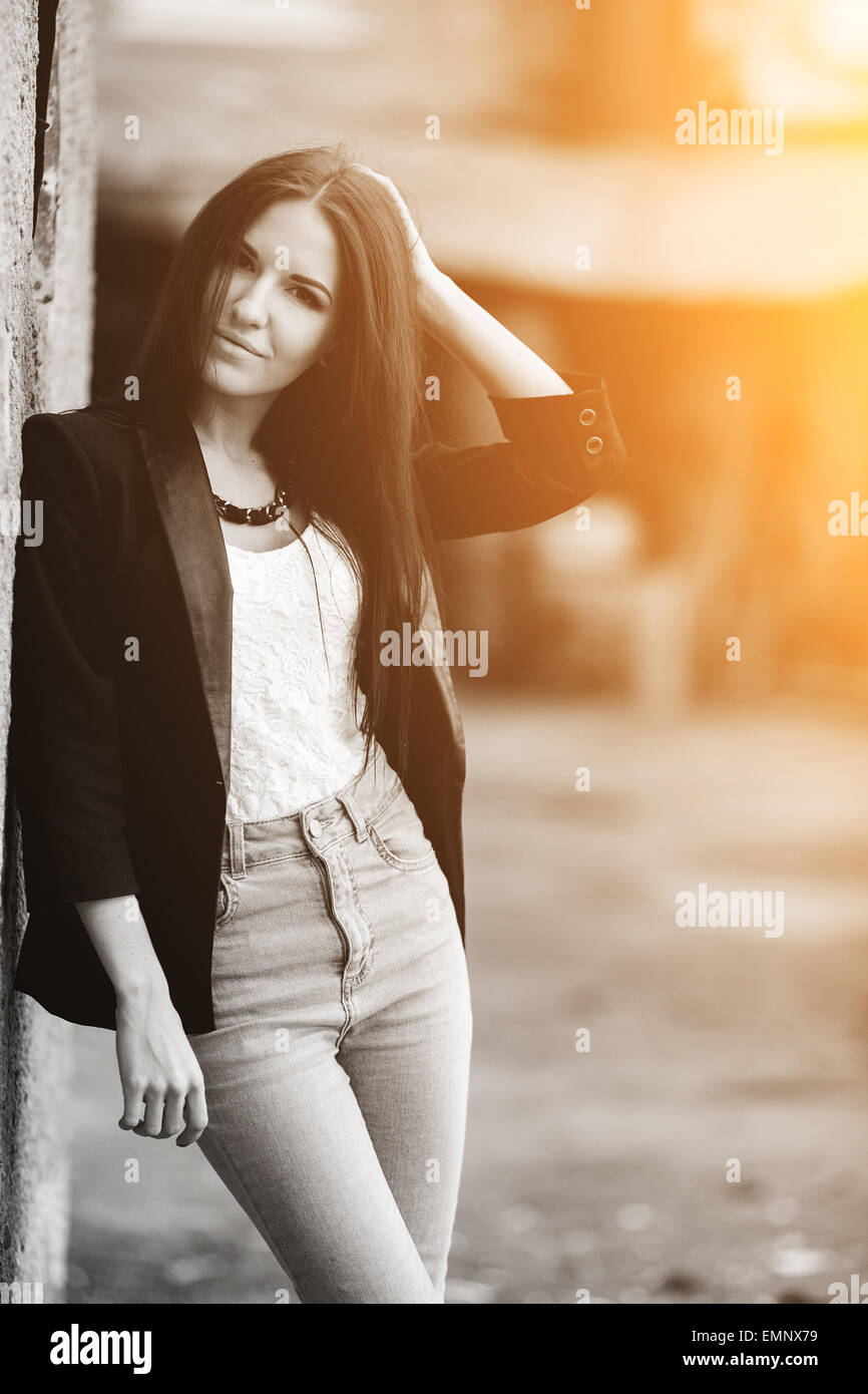 beautiful girl posing and looking at the camera Stock Photo - Alamy