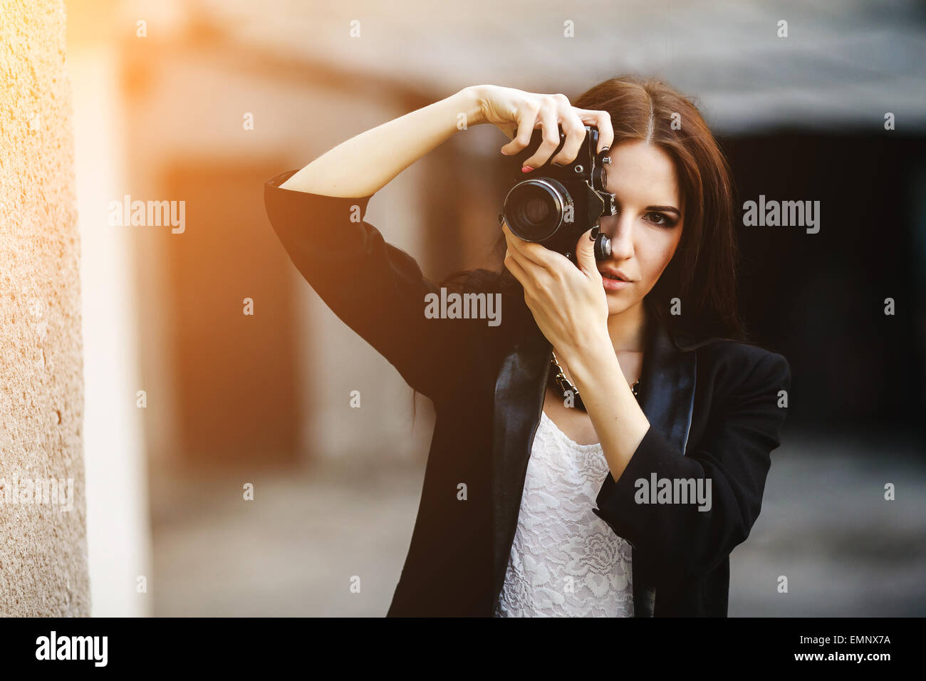 beautiful girl posing and looking at the camera Stock Photo - Alamy