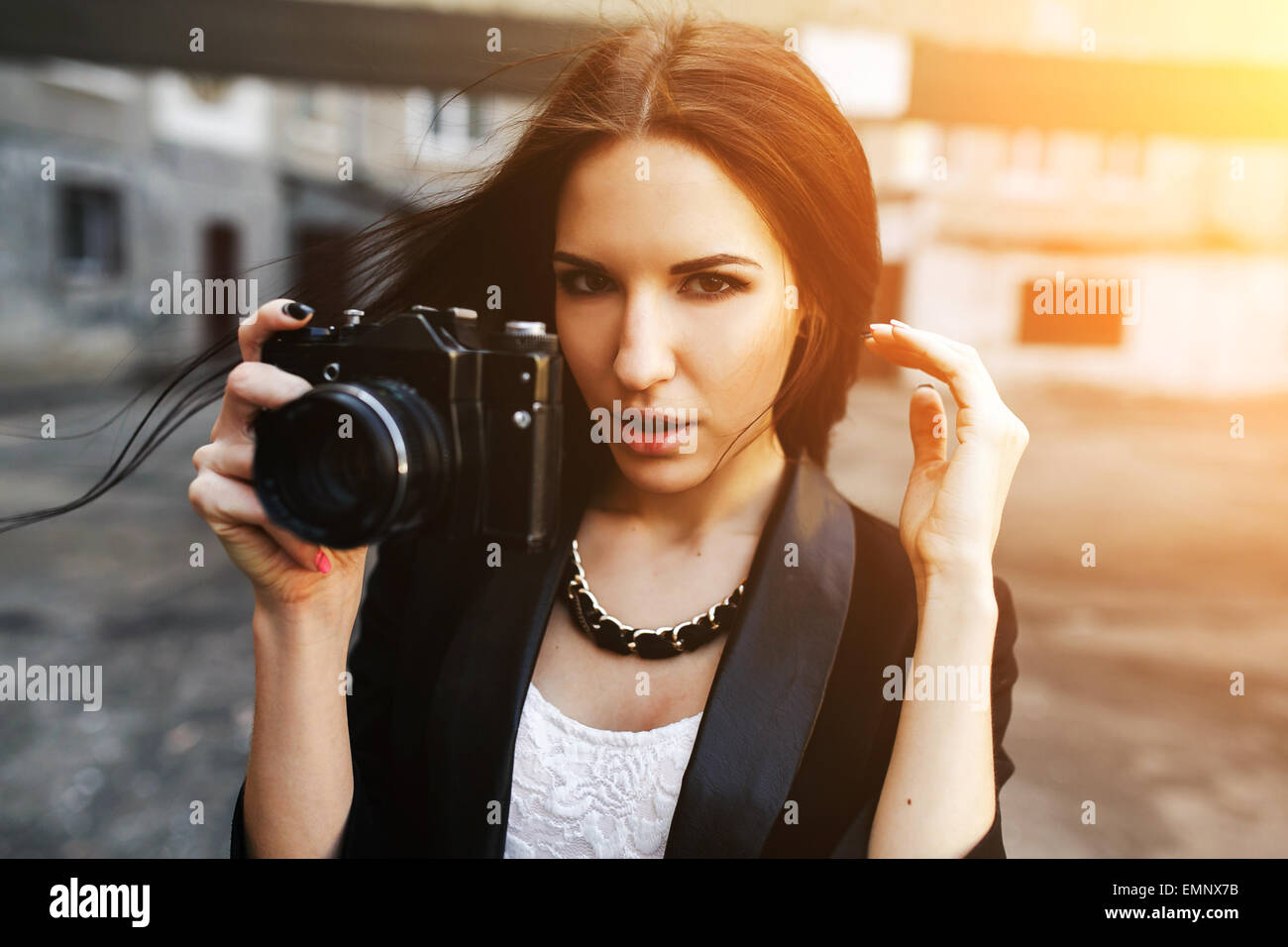 beautiful girl posing and looking at the camera Stock Photo - Alamy