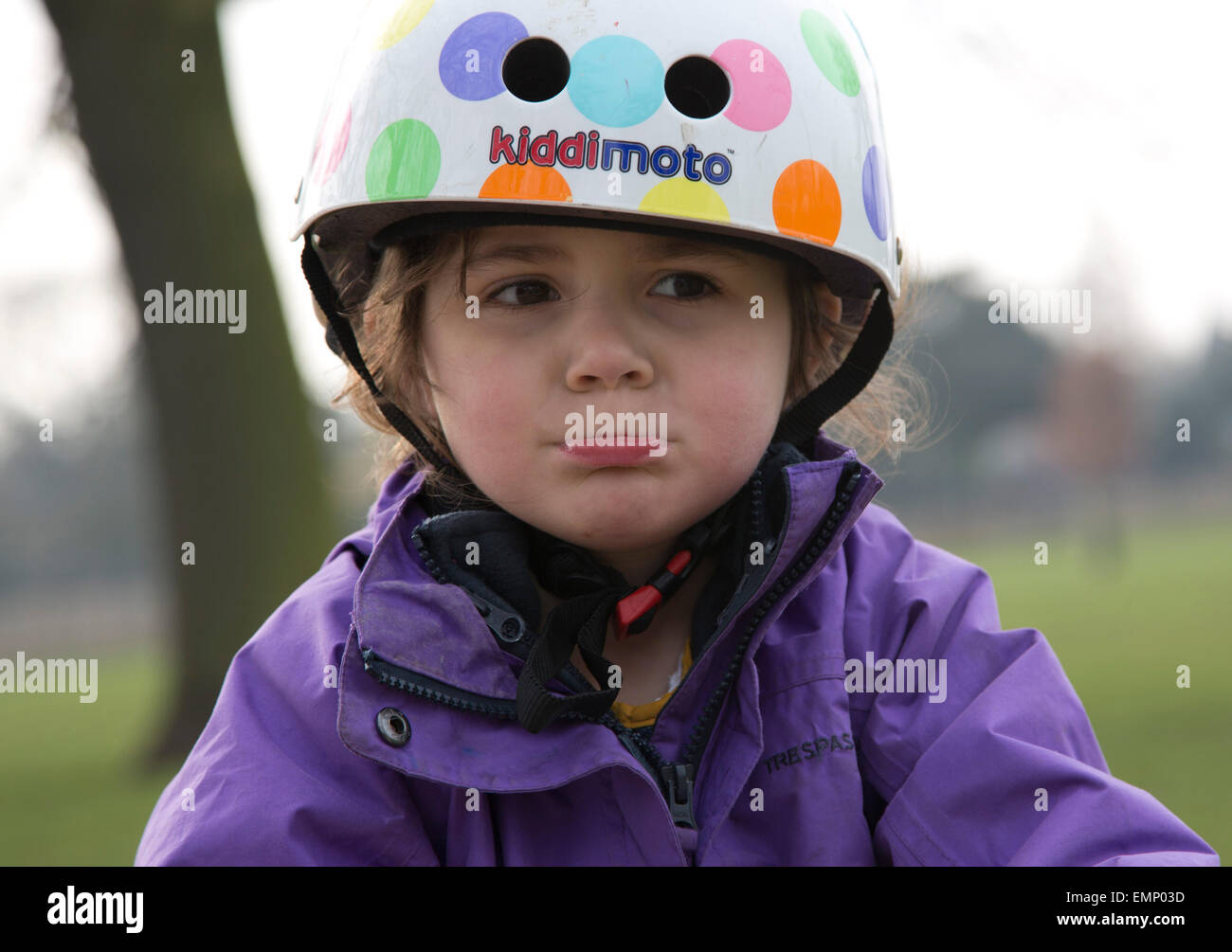 Close up of a toddler wearing a safety helmet Stock Photo Alamy
